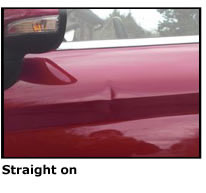 Example of left angle photo showing car dent for quote request