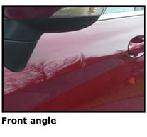 Example of right angle photo showing car dent for quote request