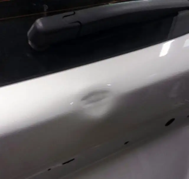 Door ding repair before and after paintless dent removal