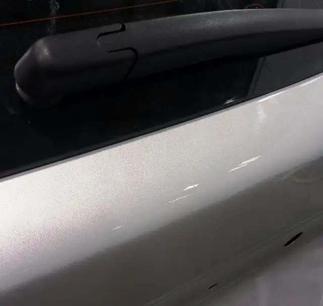 Quarter panel dent removal before and after PDR service