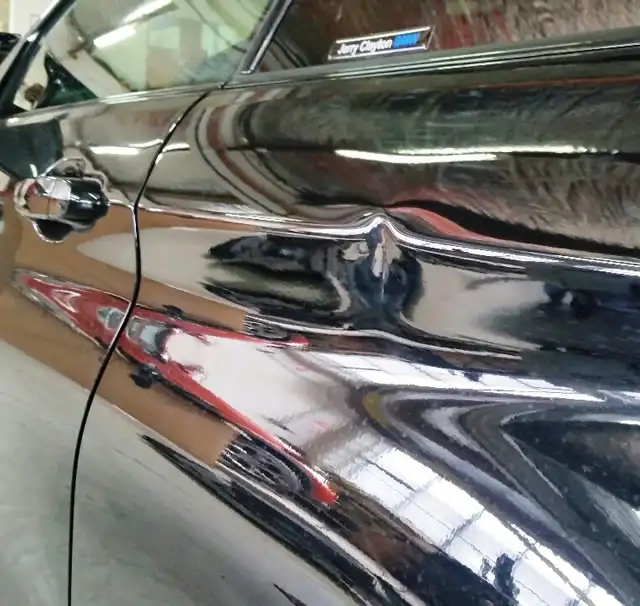 Roof dent repair results from paintless dent removal