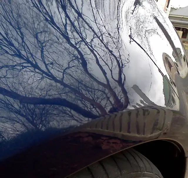 Bonnet dent removal after comparison