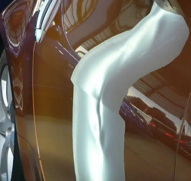 Large dent removal showing paintless dent repair capabilities